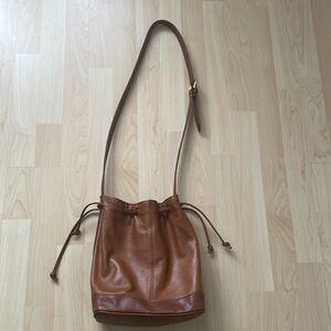 Courtnay Korea brown leather bucket crossbody bag
